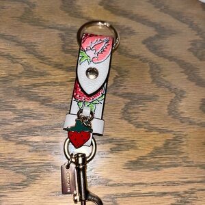 Coach Strawberry Keychain with Red and White Design
